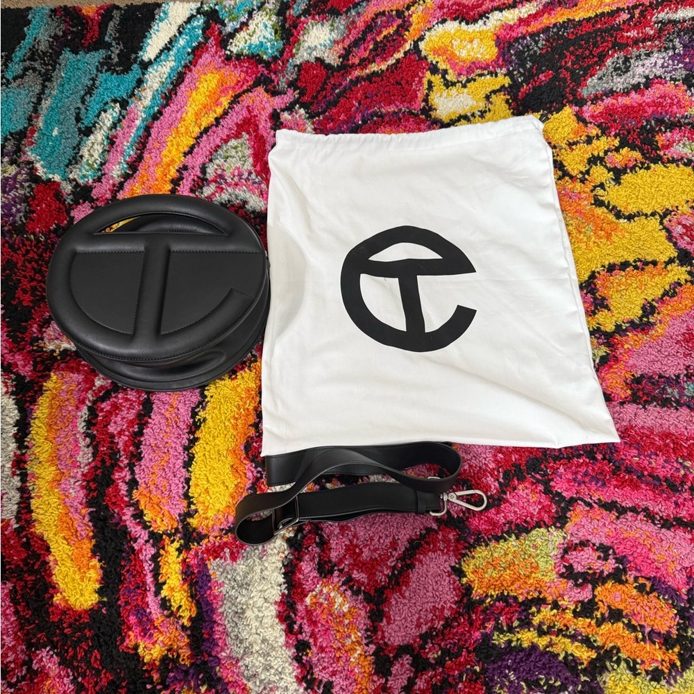 Telfar Black Circle Bag with crossbody strap and White Dust Bag